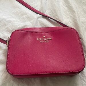 Hot pink brand new Kate Spade purse. Never used.
